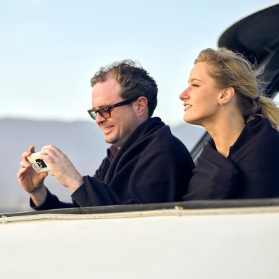 couple boarding in boat