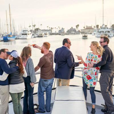 a group of people standing on a dock